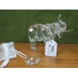 A Swarovski Crystal Model of an Elephant from the Rare Encounters Series, 11.5cm, high; a