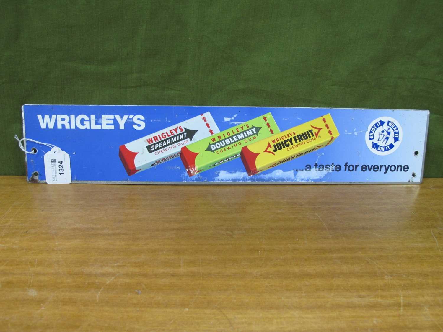 An Original Metal Advertising Sign for Wrigley's Chewing Gum, (52cm x 10cm).