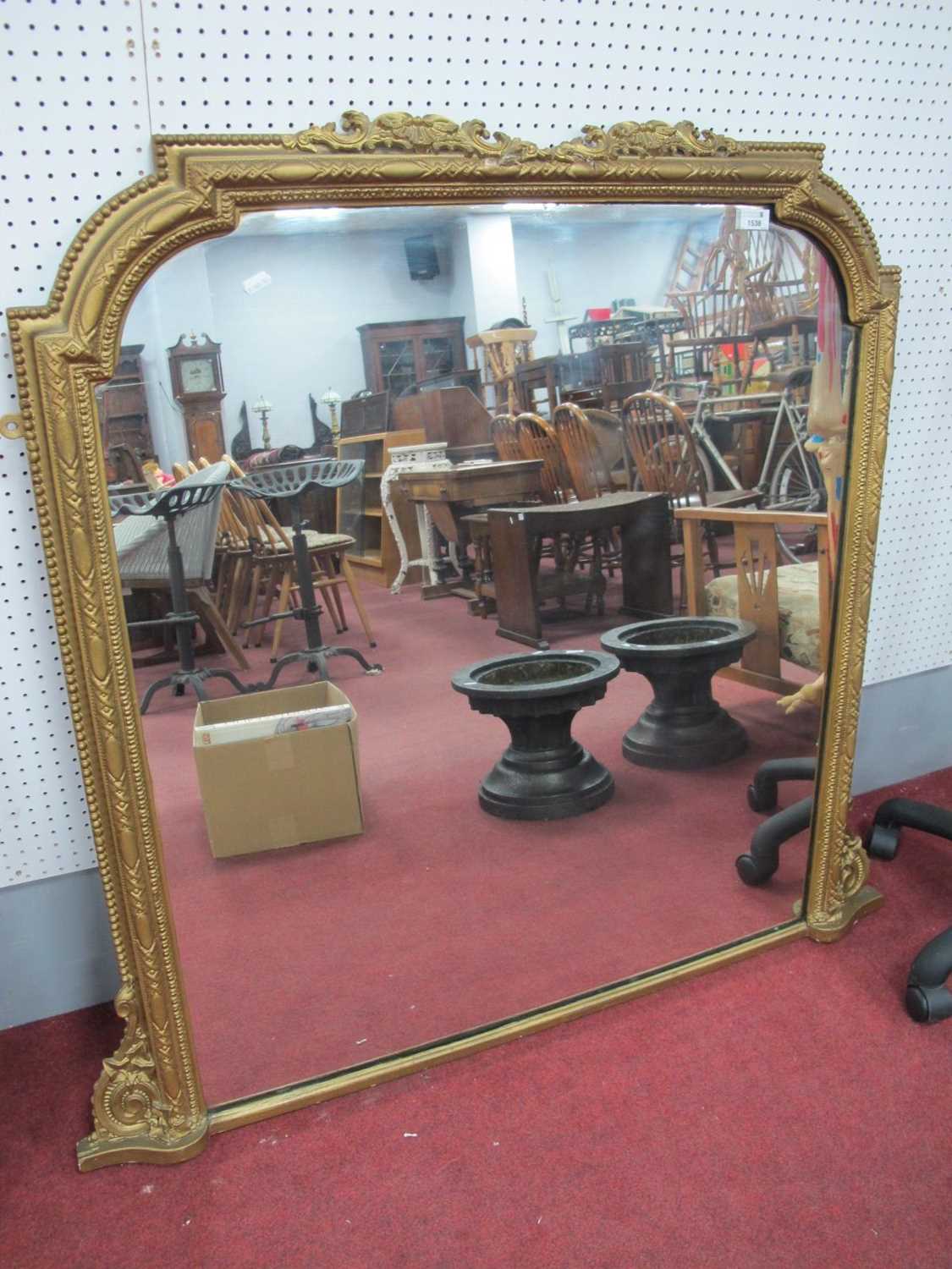 XIX Century Framed Over Mantle, with scroll and bead surround, overall 118cm wide.