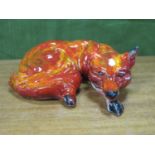 Anita Harris Model of an Earless Curled Fox, gold signed, 12cm long.