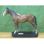 Beswick Pottery Chestnut Horse, on oval wooden plinth, overall 23cm high.