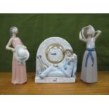Lladro Porcelain Clock, with reclining clown and lute, 21cm high, together with two Lladro figures