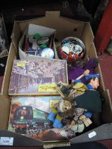 A quantity of vintage jigsaws, darts, puppets, dolls, badges, etc. 1 Box