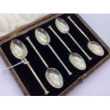 A Set of Six Hallmarked Silver Art Deco Style Coffee Spoons, in original fitted case.