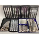 A Set of Sixteen Gentry (Sheffield) Decorative Pistol Handle Steak Knives, (six in a fitted case)