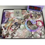 A Collection of Costume Jewellery in hues of pink and purple, to include beaded necklaces,