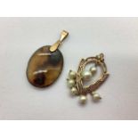 An Antique Style Pearl and Enamel Drop Pendant, of openwork design, and another drop pendant, of