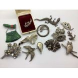 A Small Collection of Brooches, including a Victorian anchor brooch, a circular marcasite set