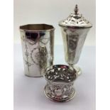 A Hallmarked Silver Shaker, of tapering panelled form, with pierced pull off cover (dented), on