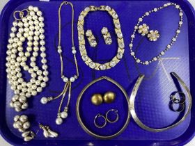 A Small Collection of Ornate Costume Jewellery, including imitation pearl bead necklaces, large clip