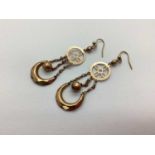 A Pair of Victorian Style Drop Earrings, of openwork design, with chain and bead detail.