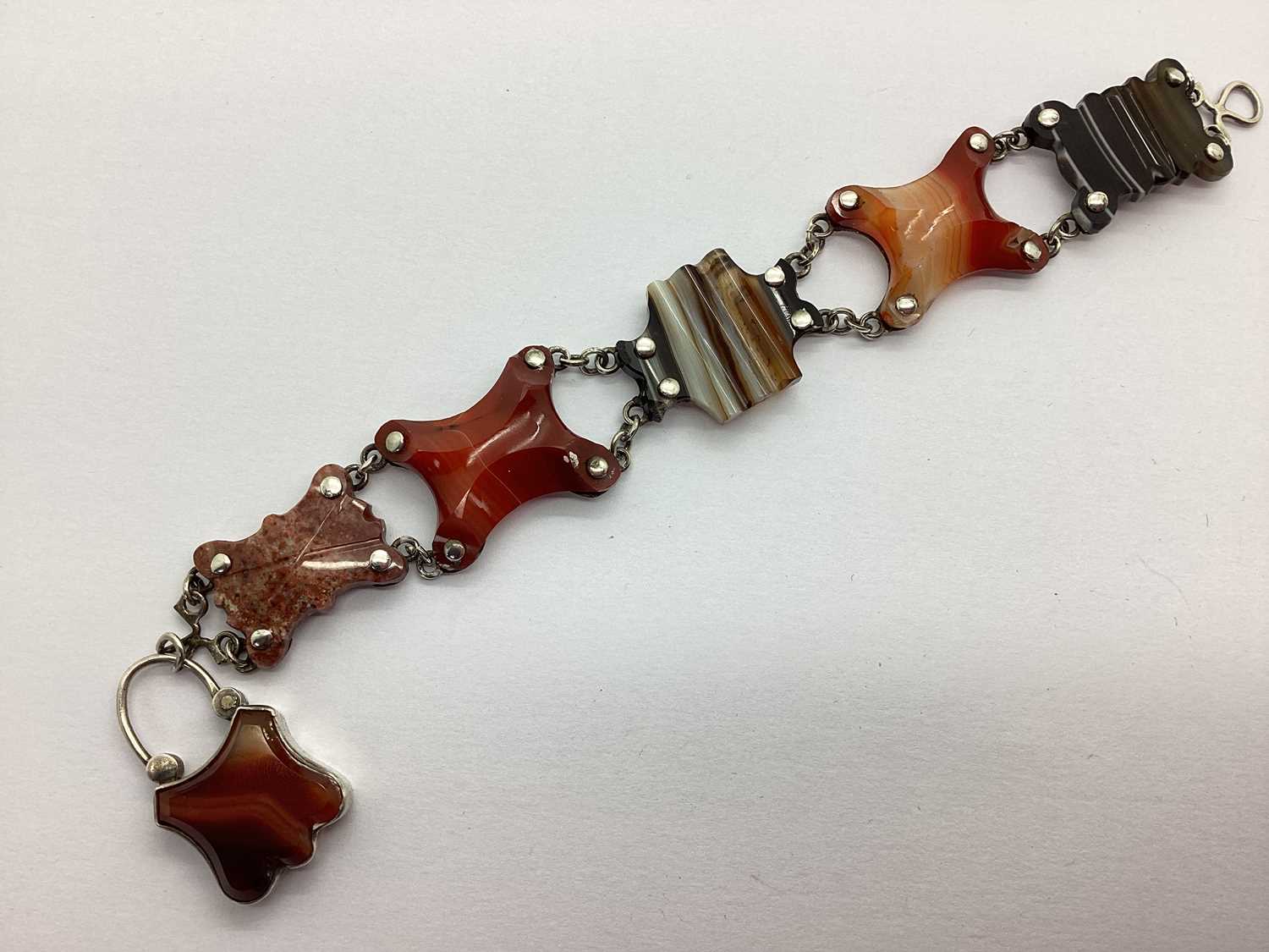A Victorian Banded Agate Panel Bracelet, the shaped links with chain connections, to hook and