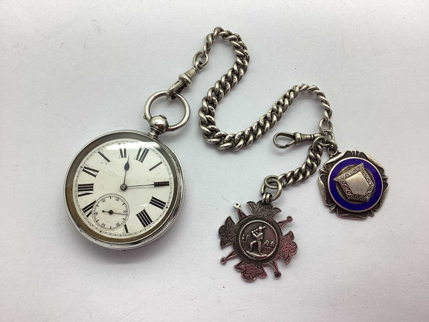 A Vintage Openface Pocket Watch, the white dial with black Roman numerals and seconds subsidiary