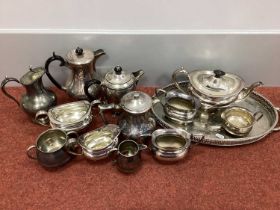 A Britanoid Plated Three Piece Tea Set, oval twin handled gallery style tray, jugs and sugar