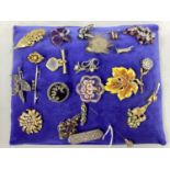 A Collection of Assorted Costume Brooches, including Art Deco style panel brooch (indistinctly