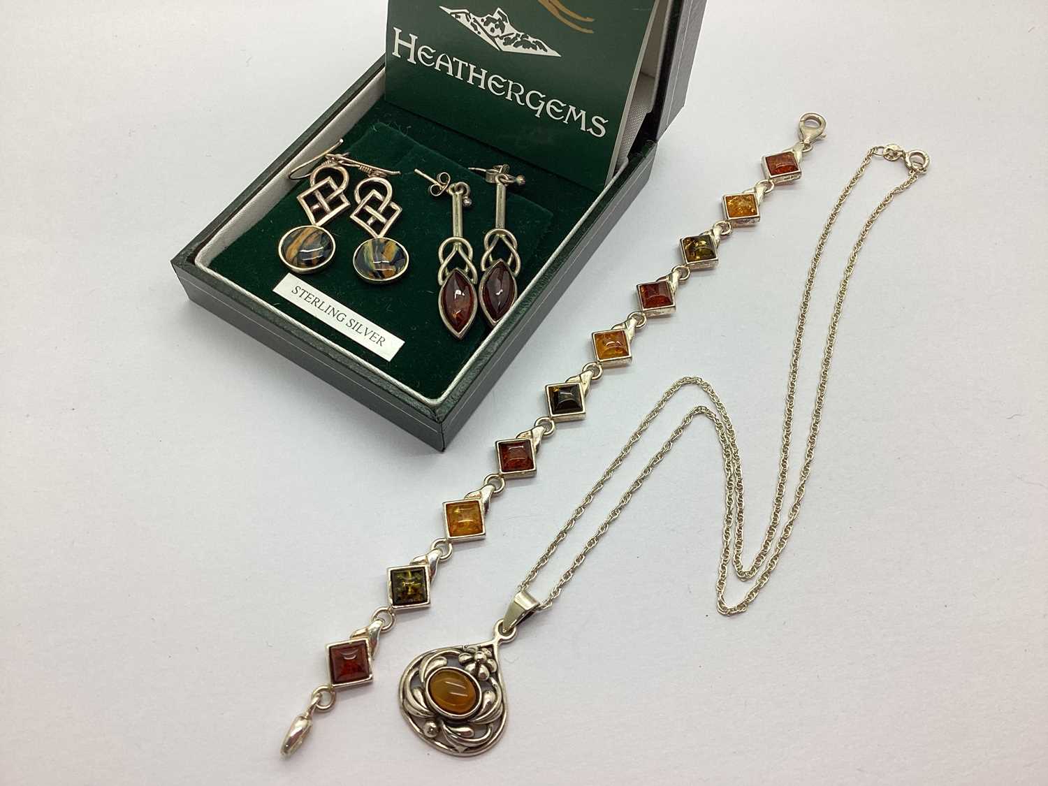 Heather Gems Earrings, modern amber set bracelet, decorative pendant, etc.