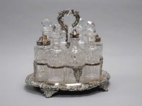 A XIX Century Plated on Copper Condiment Stand, of shaped oval form with foliate scroll decoration