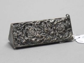 A Tooth Pick Box, detailed in relief with flowerheads, hinged lid to one end, stamped "835", 7.7cm