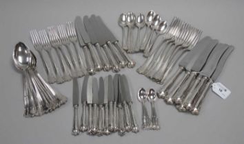 A Set of Six German Table Knives and Forks, stamped crescent and crown and "800", the knife blades