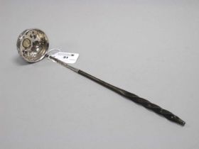 A Georgian Toddy Ladle, the circular bowl allover detailed with fruiting vines, with inset 1763