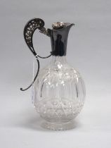 A Hallmarked Silver Mounted Cut Glass Claret Jug, HC, Sheffield 1992, with pierced scroll handle and