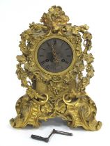 A Late XIX Century French Heavy Ormolu Mantle Clock, elaborately cast with fruiting vines and
