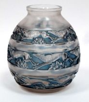 A Rene Lalique 'Soudan' Pattern Opaque Glass Vase, with blue staining, the ovoid body moulded with