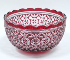 A Mid XX Century Ruby Flashed Punch Bowl, cut with a geometric design, fluted rim on circular