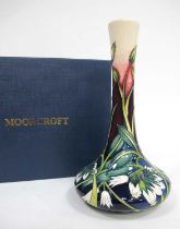 A Moorcroft Pottery Bottle Vase, painted in the 'Comfrey' pattern, impressed and painted marks,