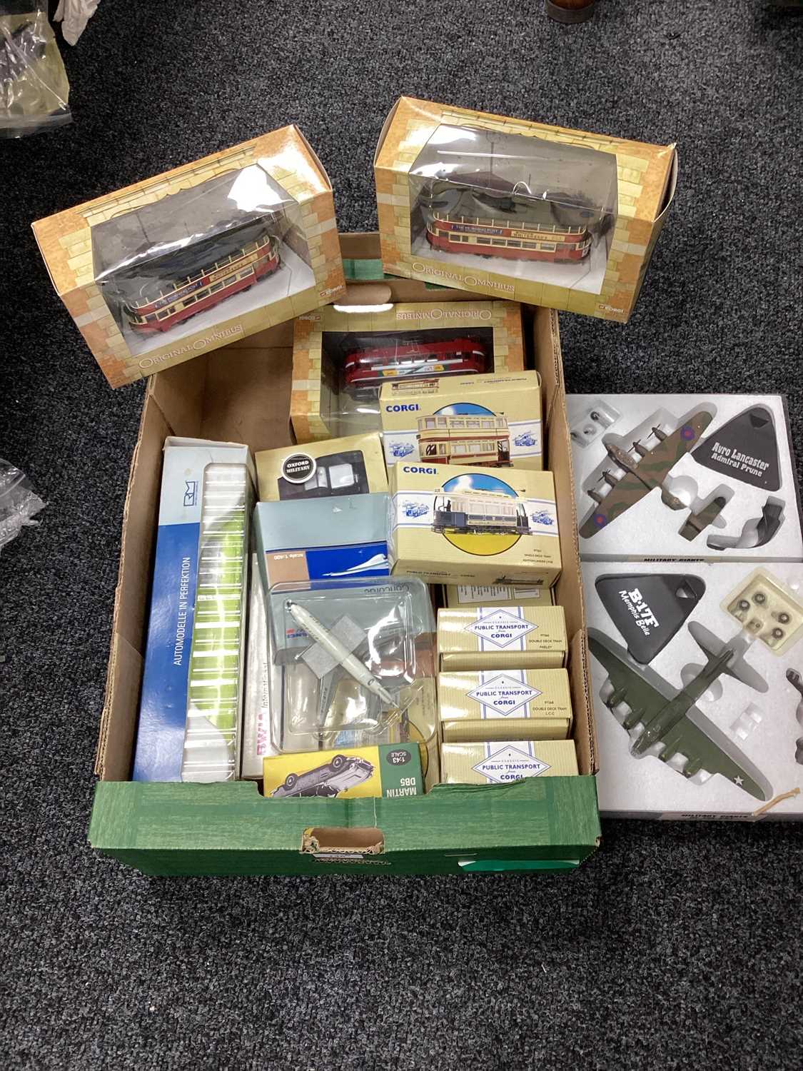 Diecast various commercial vehicles mainly trams, airplanes and cars from Corgi and others, boxed,