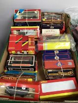 OO gauge railway rolling stock and coaches by Hornby, Mainline, Lima etc., boxed, approx. 30