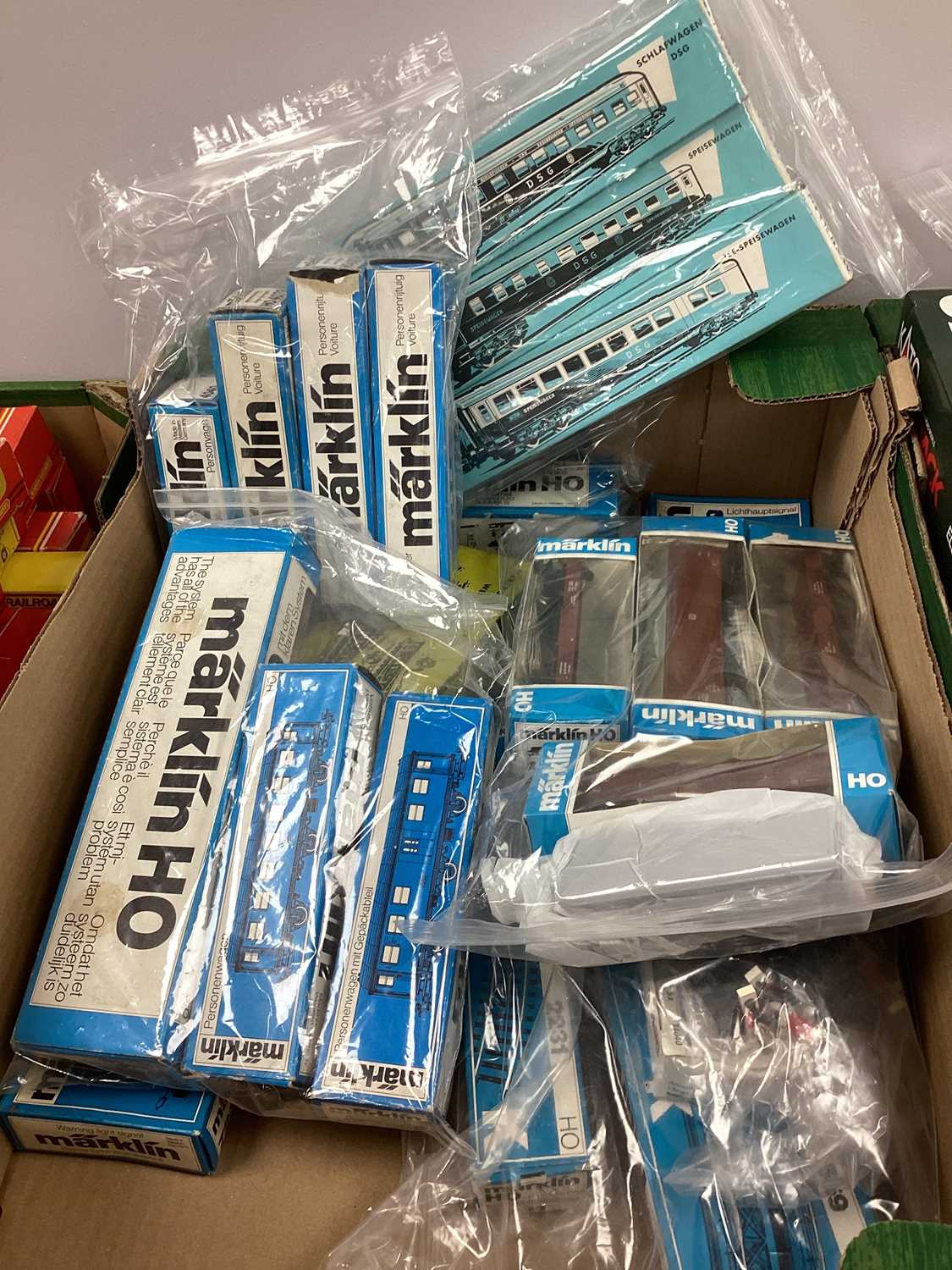 Marklin HO gauge rolling stock, coaches, lineside accessories, track etc, boxed, (30).