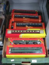 Eighteen OO Gauge Outline British Coaches by Hornby, boxed.