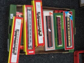 Nineteen OO Gauge Outline British Coaches by Hornby, Lima and other, boxed.