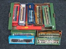 Sixteen OO Gauge Outline British Coaches by Hornby, Mainline, Bachmann and other, boxed.