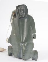 INUIT STONE CARVING OF A FISHERMAN
