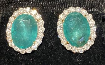 18 CT. EMERALD AND DIAMOND CLUSTER EARRINGS