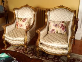 PAIR OF LOUIS XV STYLE CARVED GILTWOOD ARMCHAIRS