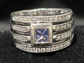 18 CT. WHITE GOLD TANZANITE & DIAMOND RING