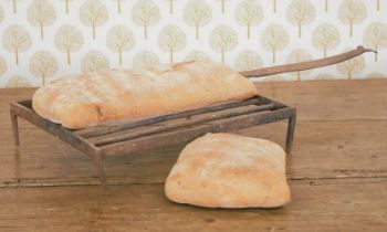 19TH-CENTURY FORGED IRON BREAD GRIDDLE