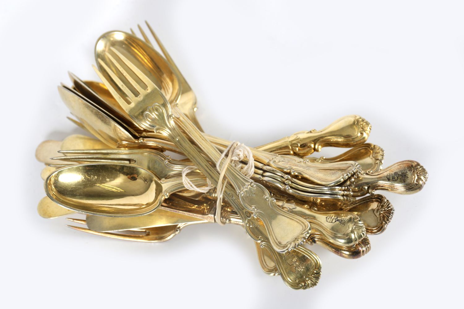 SET OF GILDED SILVER CUTLERY: