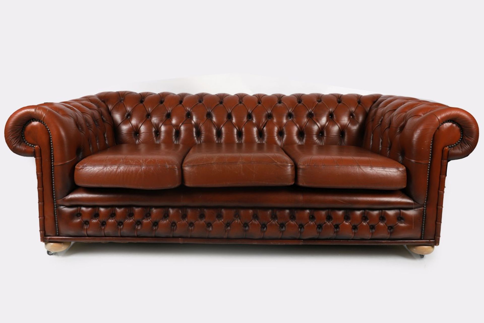 LEATHER UPHOLSTERED ROLL BACK CHESTERFIELD SETTEE