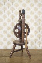 MINIATURE MODEL OF A SPINNING WHEEL