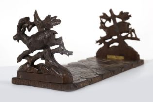 19TH-CENTURY CARVED BLACK FOREST BOOKSLIDE