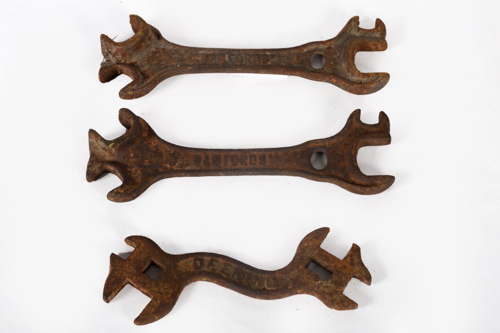3 EARLY CAST IRON WRENCHES