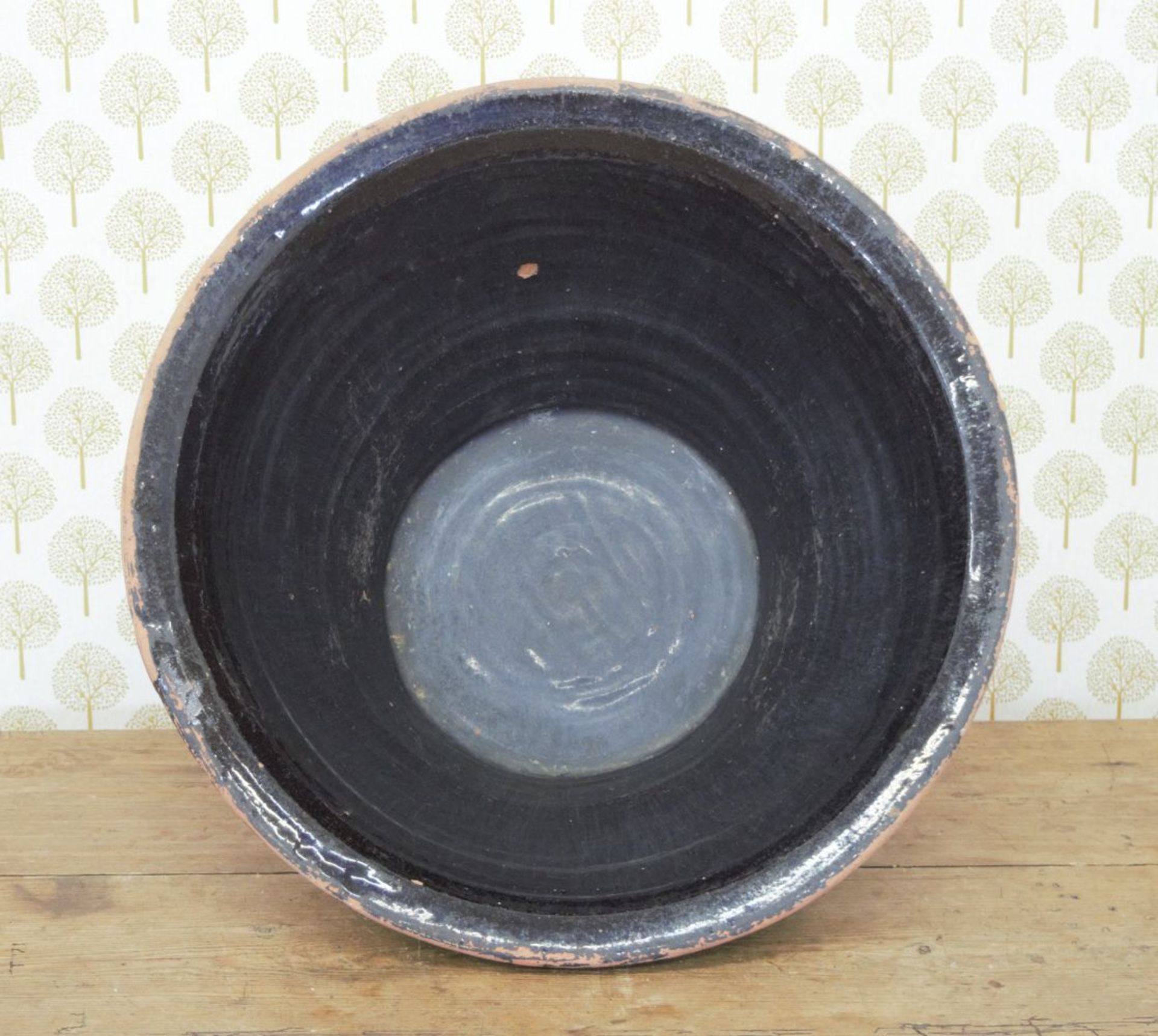 LARGE BLACK GLAZED POTTERY DAIRY BOWL - Image 2 of 2