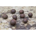WITHDRAWN GROUP OF 8 CANNON BALLS