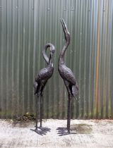 PAIR OF BRONZE GARDEN FIGURES