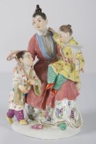 MEISSEN GROUP OF A MAIDEN AND 2 BOYS