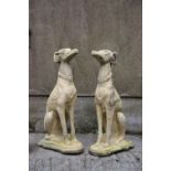 PAIR OF MOULDED STONE GARDEN SCULPTURES